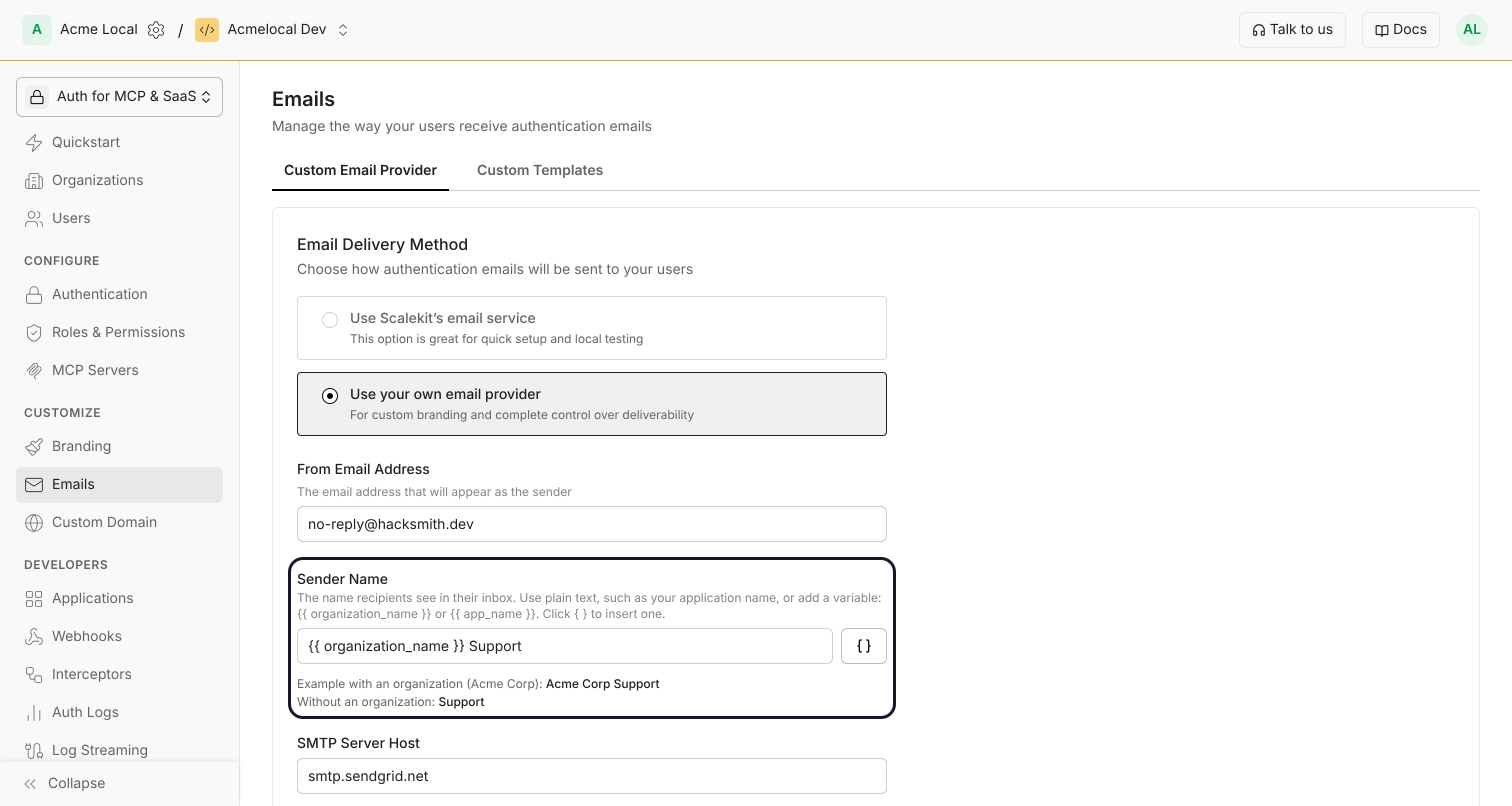 Sender Name using the organization name variable followed by Support, with previews for Acme Corp and for an email without an organization