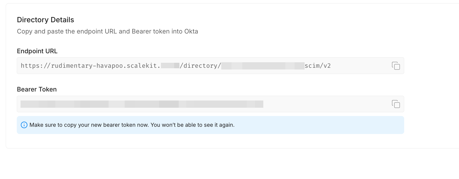 Okta directory sync setup: Endpoint URL and one-time visible bearer token provided.